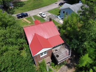 home with new red roof