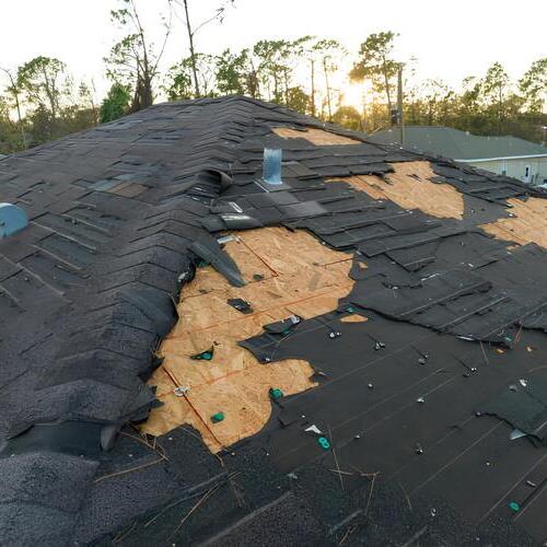 shingles torn off a roof